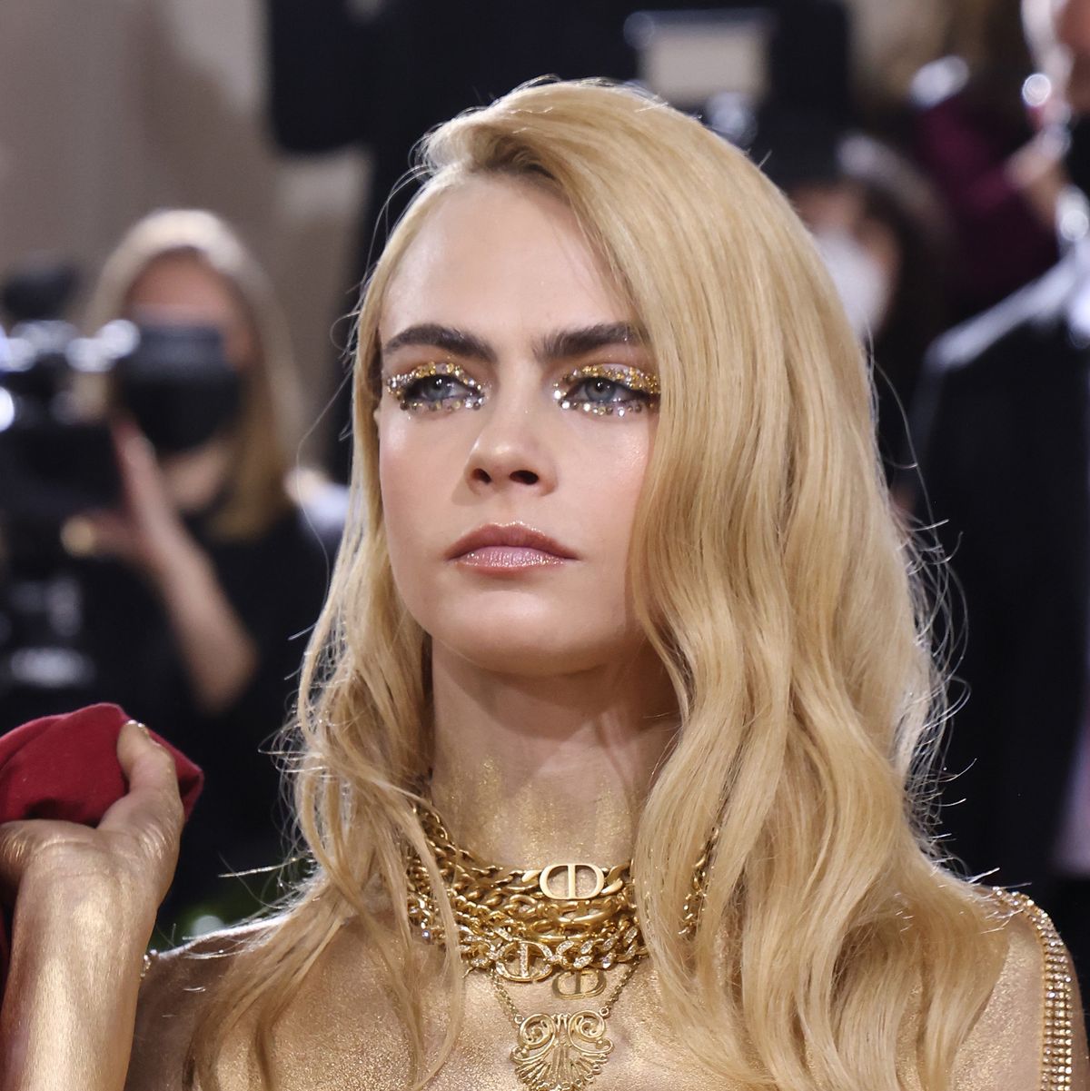 Cara Delevingne attended the Met Gala topless and painted in gold