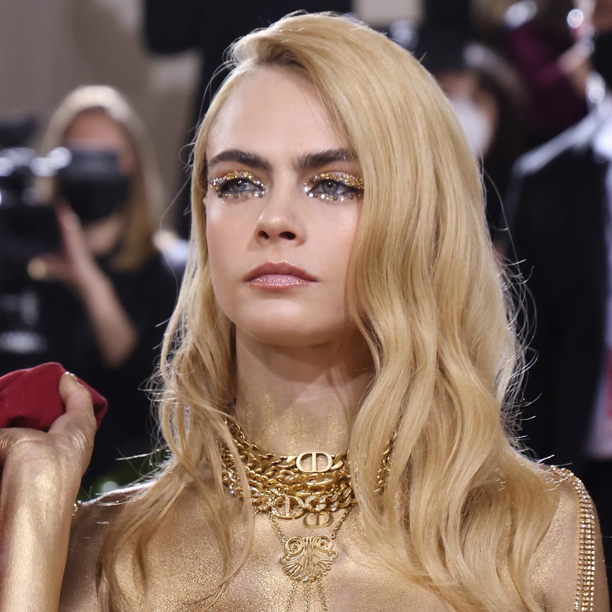 Cara Delevingne attended the Met Gala topless and painted in gold