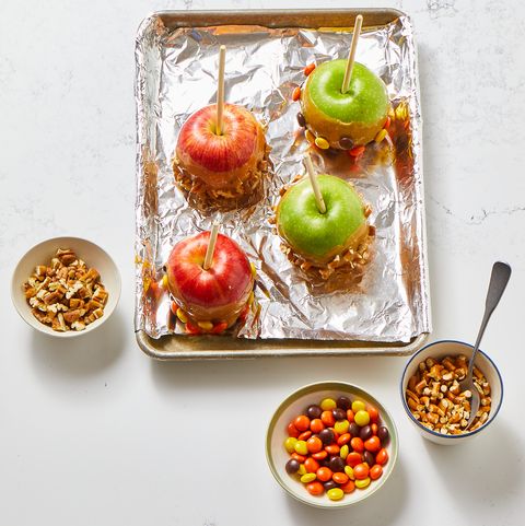 caramel apples dipped in candy and nuts