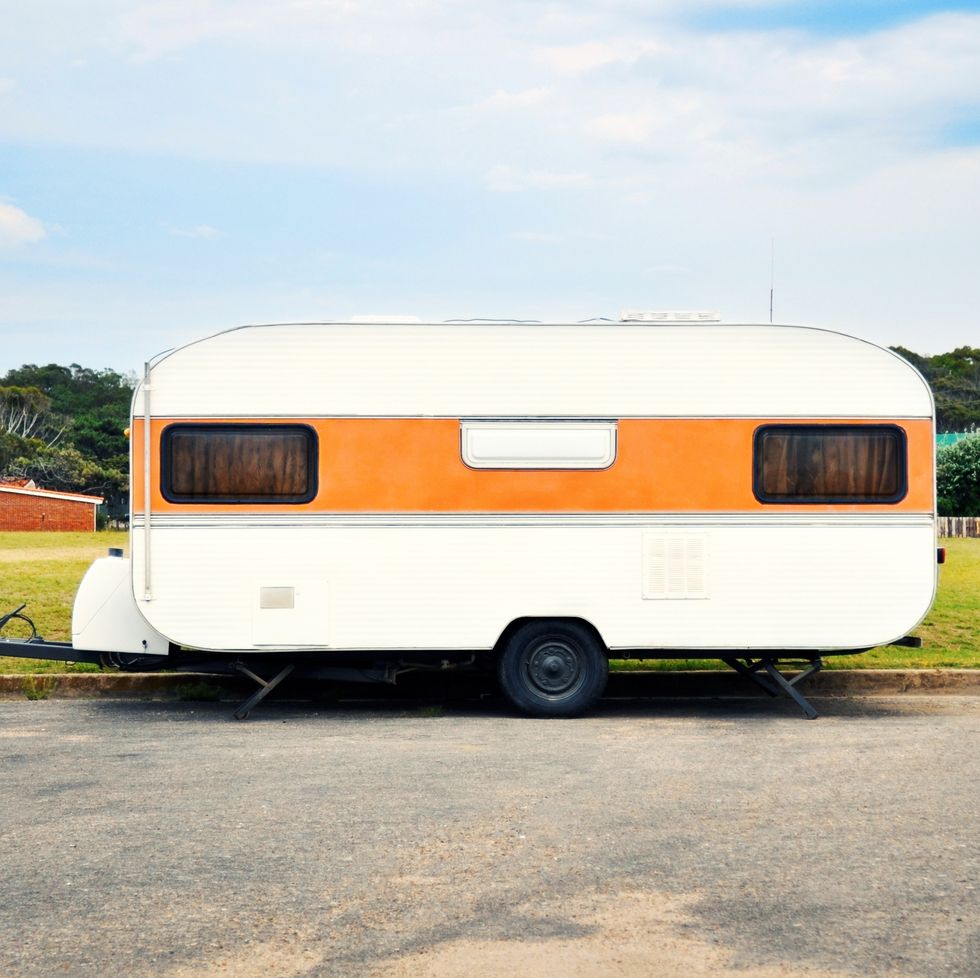 caravan, side view of a camper van on street