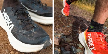 two pairs of trail running shoes, a black pair on the left and a red pair on the right