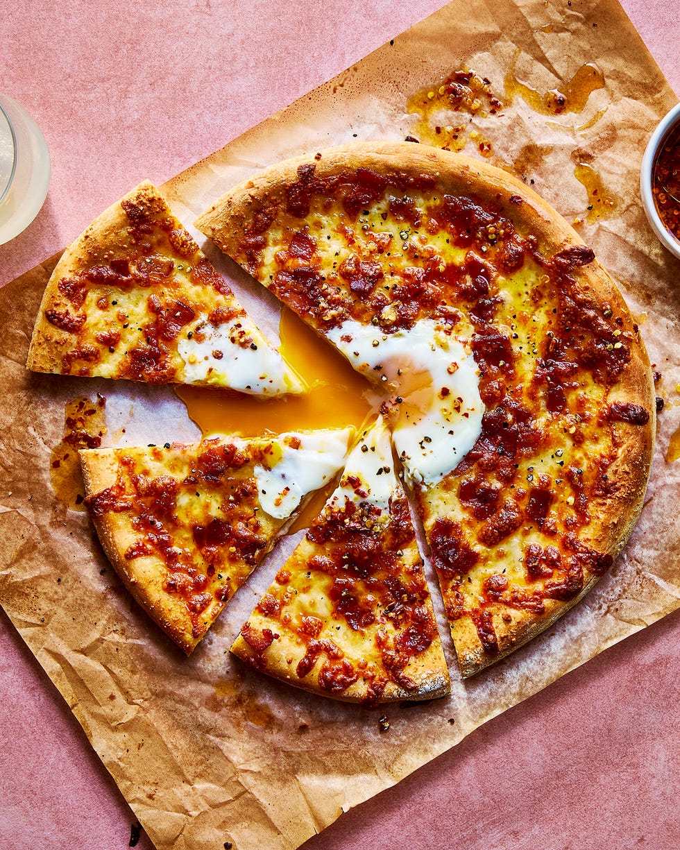 pizza with an egg baked in the middle