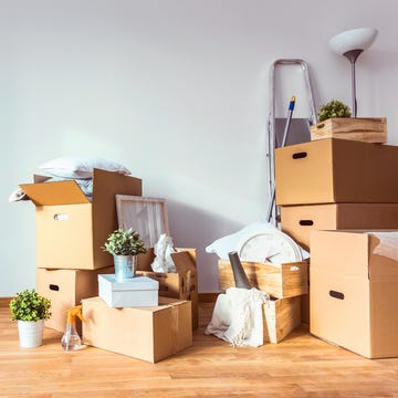 cardboard boxes and cleaning things for moving into a new home