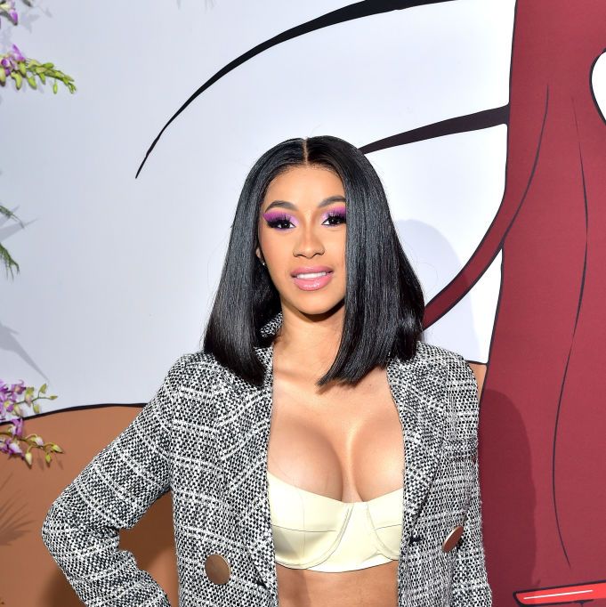 Cardi B looks incredible in a bra top and miniskirt just five
