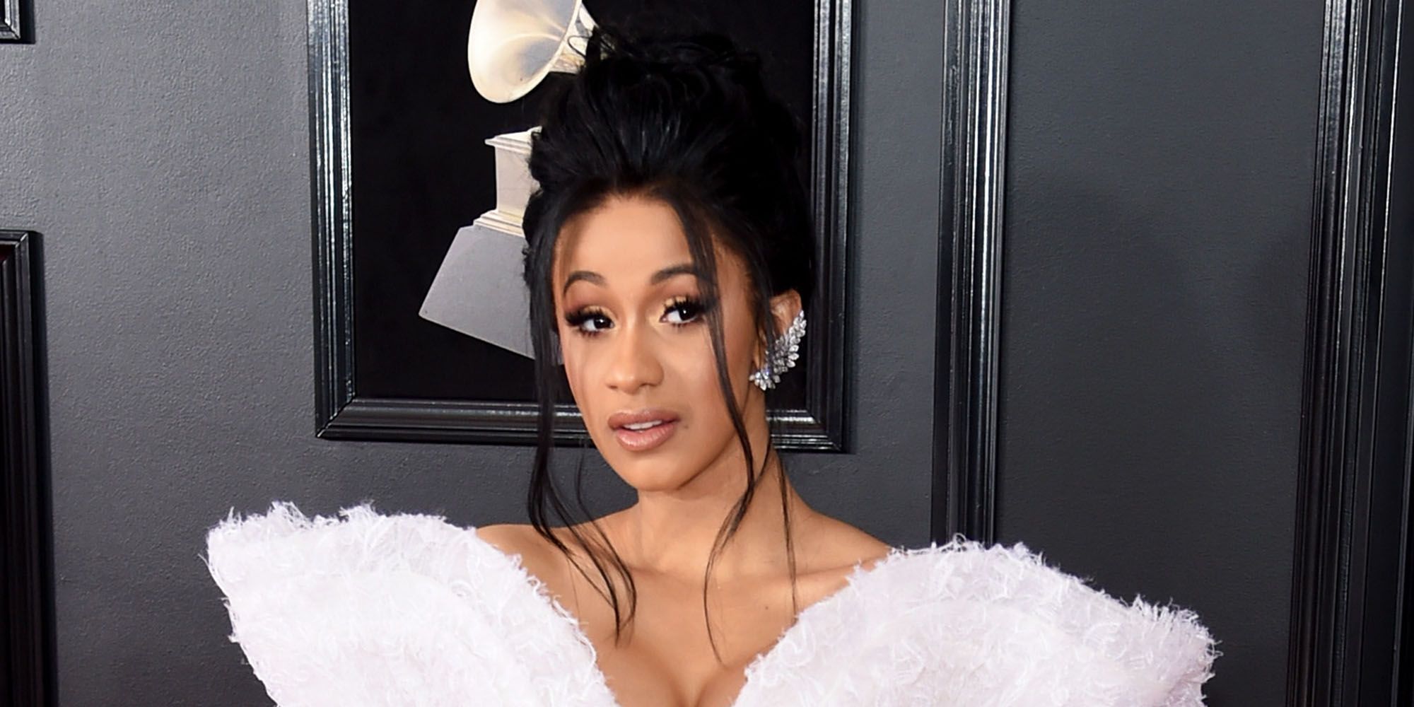 Cardi B Performed Money During the Grammys and Powered Through a Wardrobe  Malfunction
