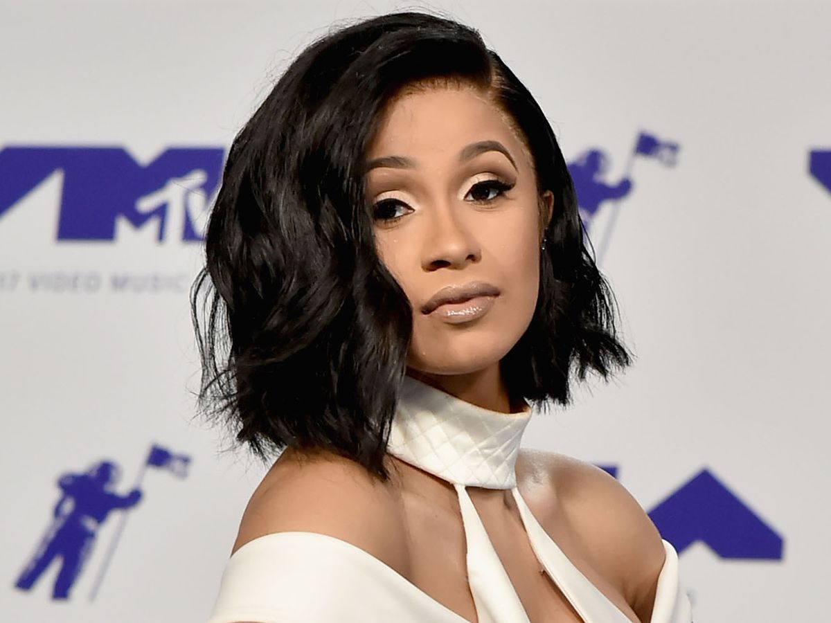 Guys, Cardi B just made founding father low ponytails cool