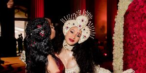 Red, Fashion, Headpiece, Event, Performance, Dress, Costume design, Costume, Stage, Black hair, 