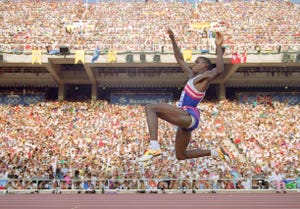 carl lewis of the usa flies through the air during