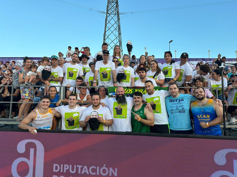 a group of people posing for a photo