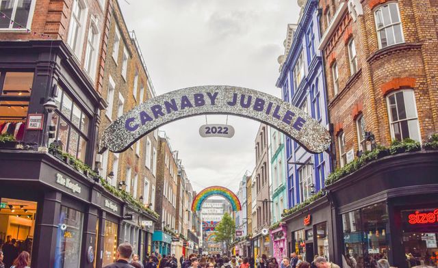 a new installation has been unveiled in londons iconic carnaby street celebrating the queens platinum jubilee