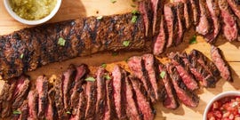 sliced carne asada with pico de gallo, limes, and salsa verde