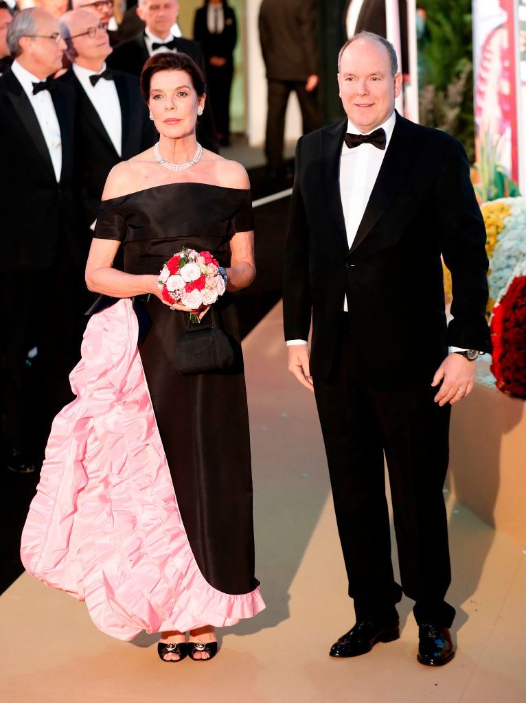 prince albert ii of monaco r and princess caroline of hanover l pose as they arrive for the bal de la rose rose ball, in monaco, on march 30, 2019   the rose ball is a traditional annual charity event in the principality of monaco this year the theme is riviera, designed by late german karl lagerfeld and princess caroline of hanover photo by sebastien nogier  pool  afp        photo credit should read sebastien nogierafp via getty images