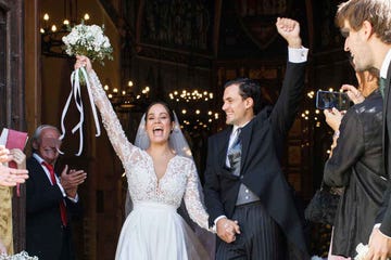 a man and woman in wedding attire