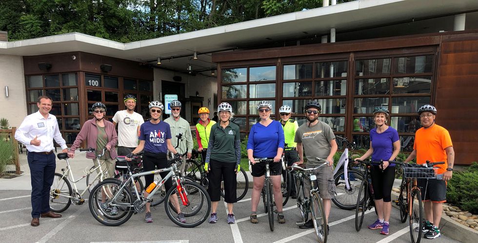 dr cooley at a bike walk knoxville ride event in 2019 with elected officials