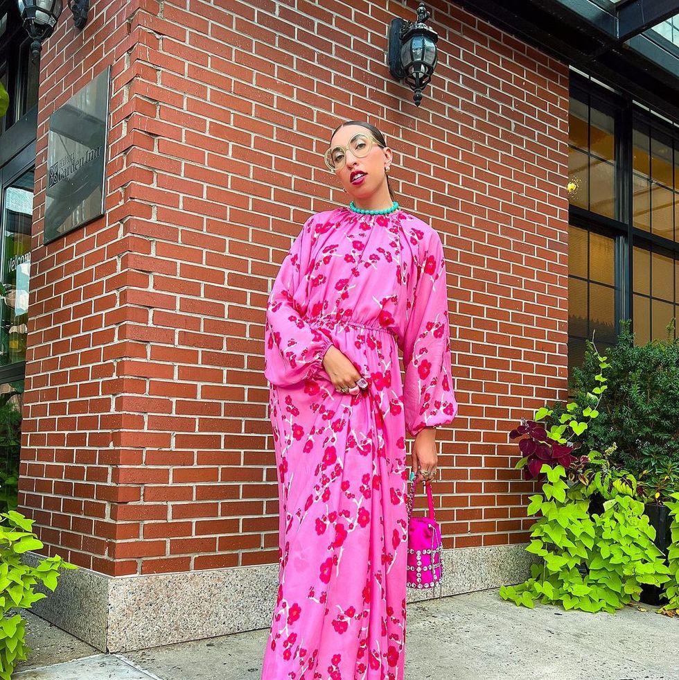 what to wear easter sunday caroline vazzana wearing a long sleeve pink floral maxi dress