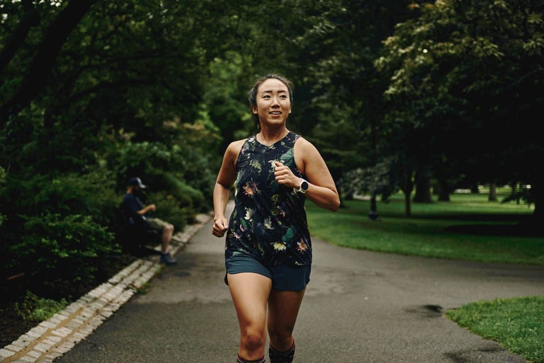 carolyn su running and stretching along her regular routes outside of boston in september 2020