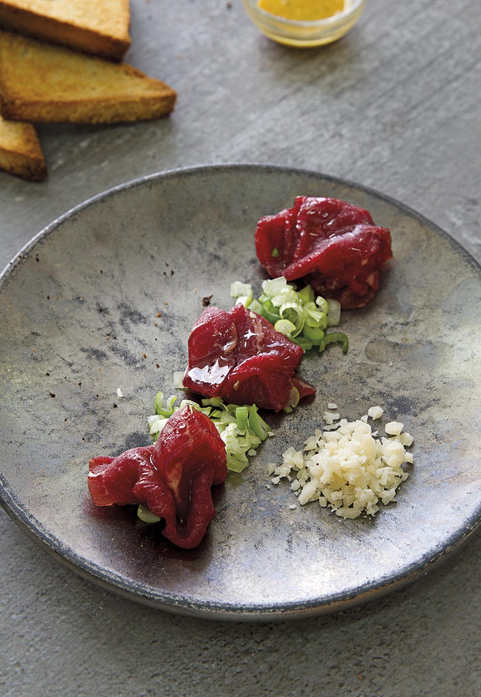 Carpaccio con cebolleta