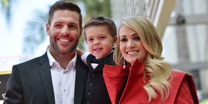 Carrie Underwood with husband Mike and son Isaiah