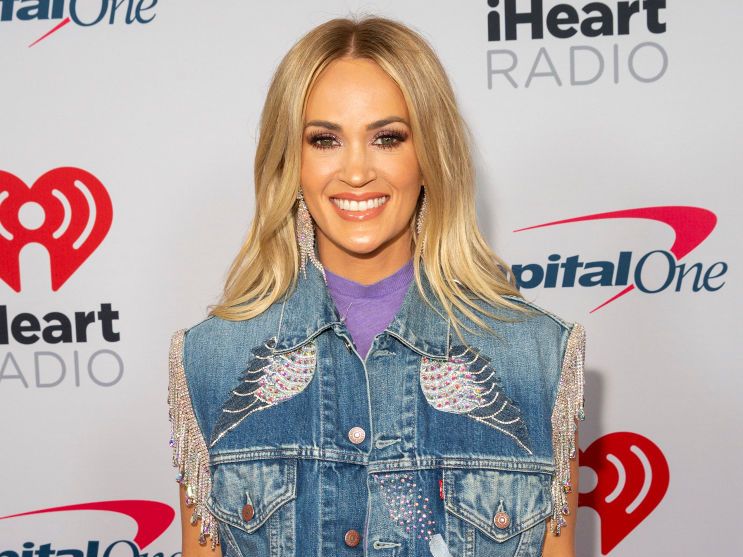 Carrie Underwood Shows Off Those Famous Sculpted Legs in Mini Denim Shorts