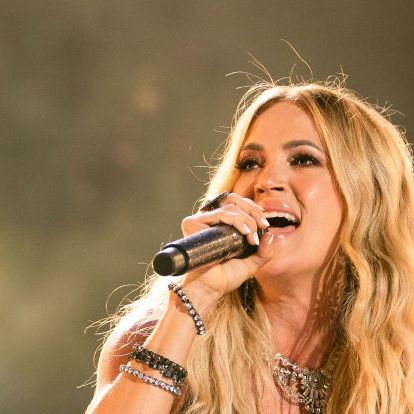 Carrie Underwood Looks Incredible in Short Shorts and Rhinestone Cowboy  Boots