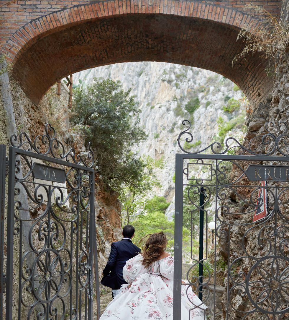 bride running away in capri