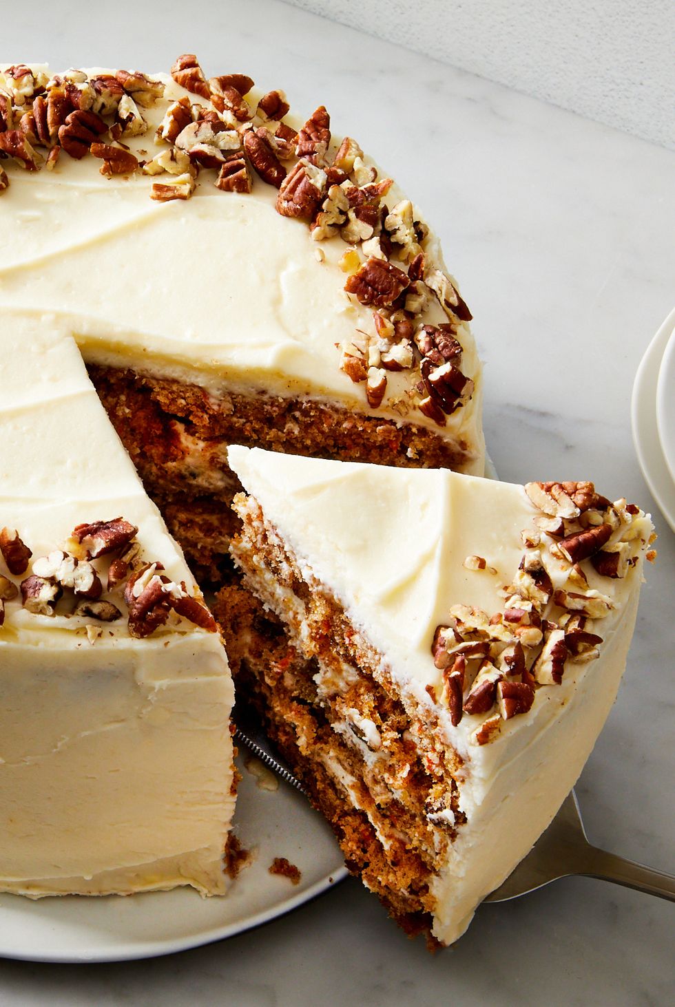 carrot cake with cream cheese icing and pecans