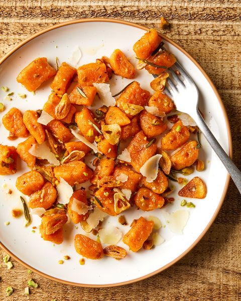 carrot gnocchi with pistachios and shaved parmesan