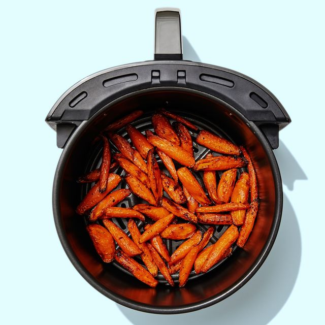air fryer with cooked carrots