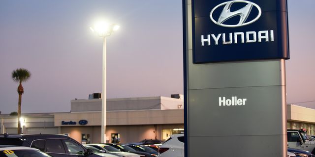 Cars are seen at a Hyundai car dealership.
 Hyundai and Kia...