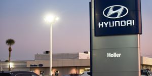 Cars are seen at a Hyundai car dealership.
  Hyundai and Kia...