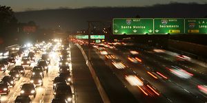 los angeles freeways swarm in the evening darkness