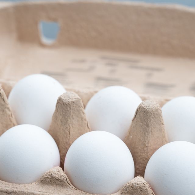 carton full of white eggs.