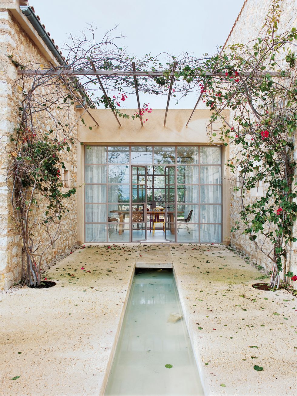 a country house in mallorca with neutral tones and colorful touches