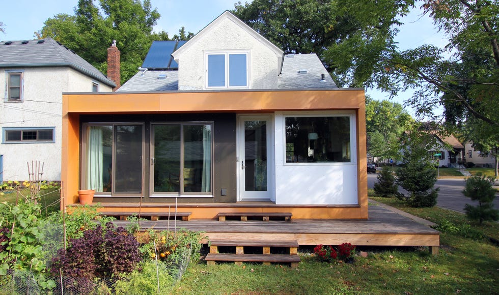 casa con pabellón de construcción sostenible con acceso al jardín