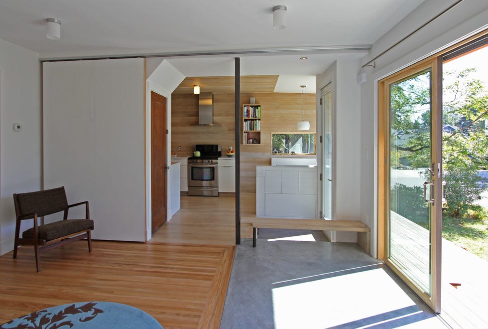 casa con pabellón de construcción sostenible con acceso al jardín
