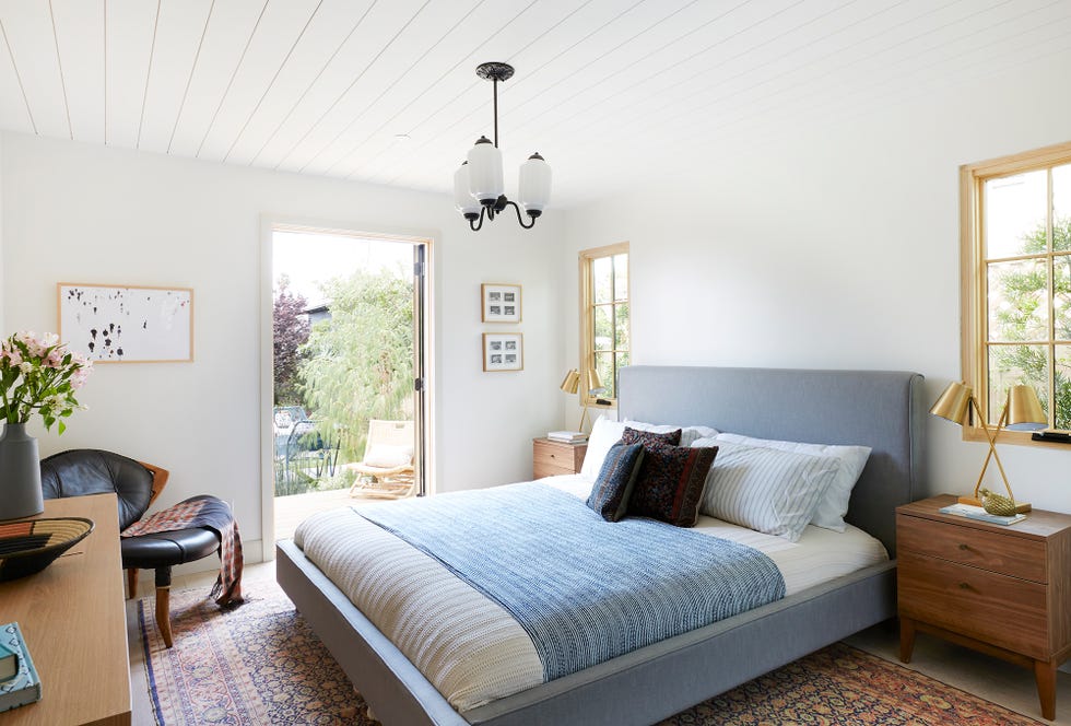 dormitorio de estilo contemporáneo abierto al jardín