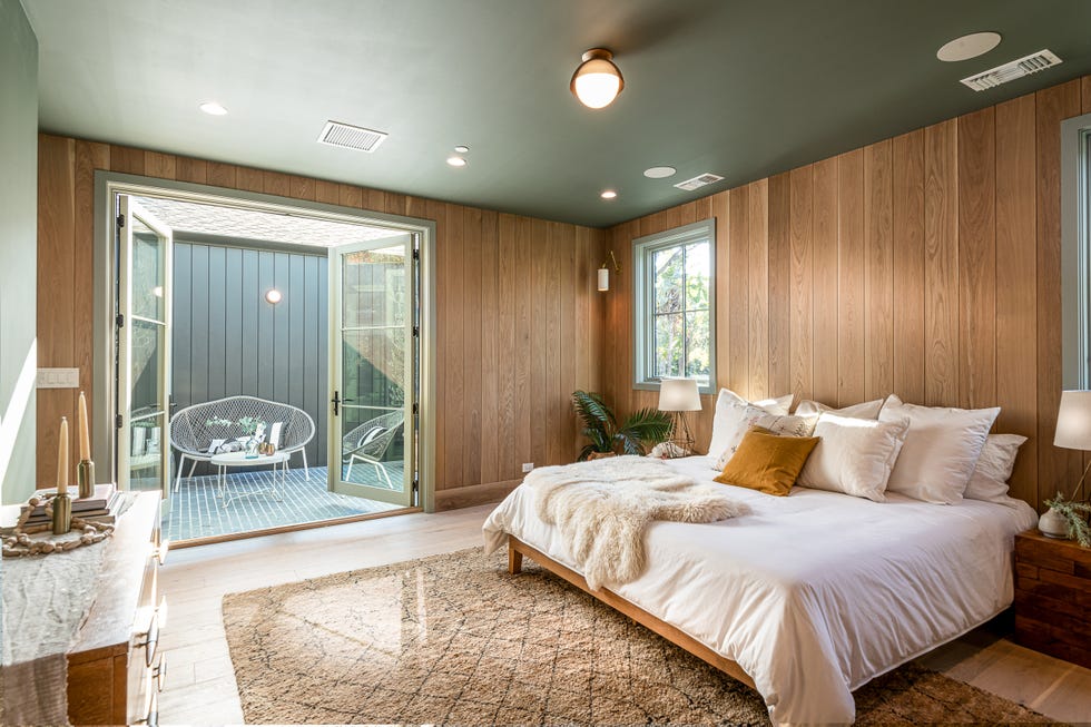 dormitorio de estilo scandifornian abierto a la terraza