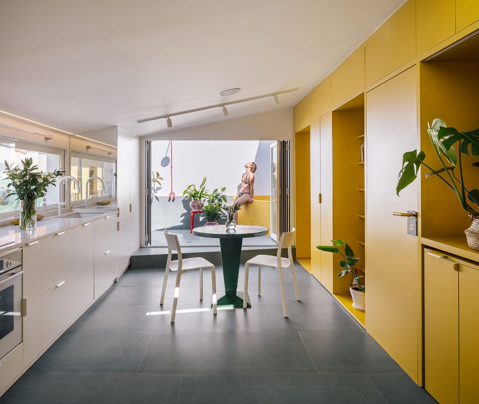 casa gialla gon architects, una reforma integral de ático con terraza