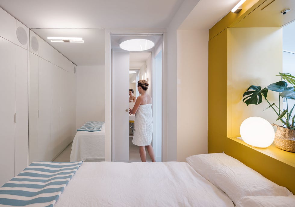 casa gialla gon architects, una reforma integral de ático con terraza