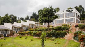 a building with a garden in front of it