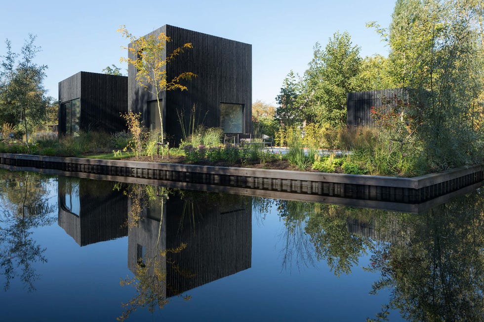 Casa de campo moderna: Exterior negro