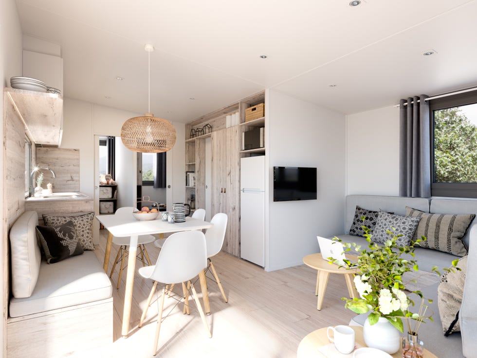 Salón-comedor-cocina de estilo nórdico con inspiración japonesa