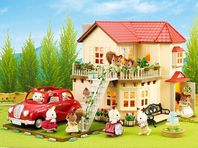 Casa de muñecas con figuritas de animales
