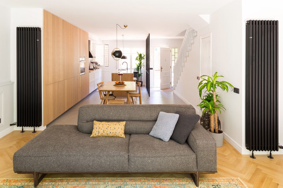 salón abierto al comedor y a la cocina con diseño contemporáneo