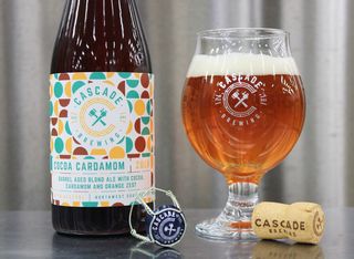 cascade brewing cocoa cardamon beer bottle and glass