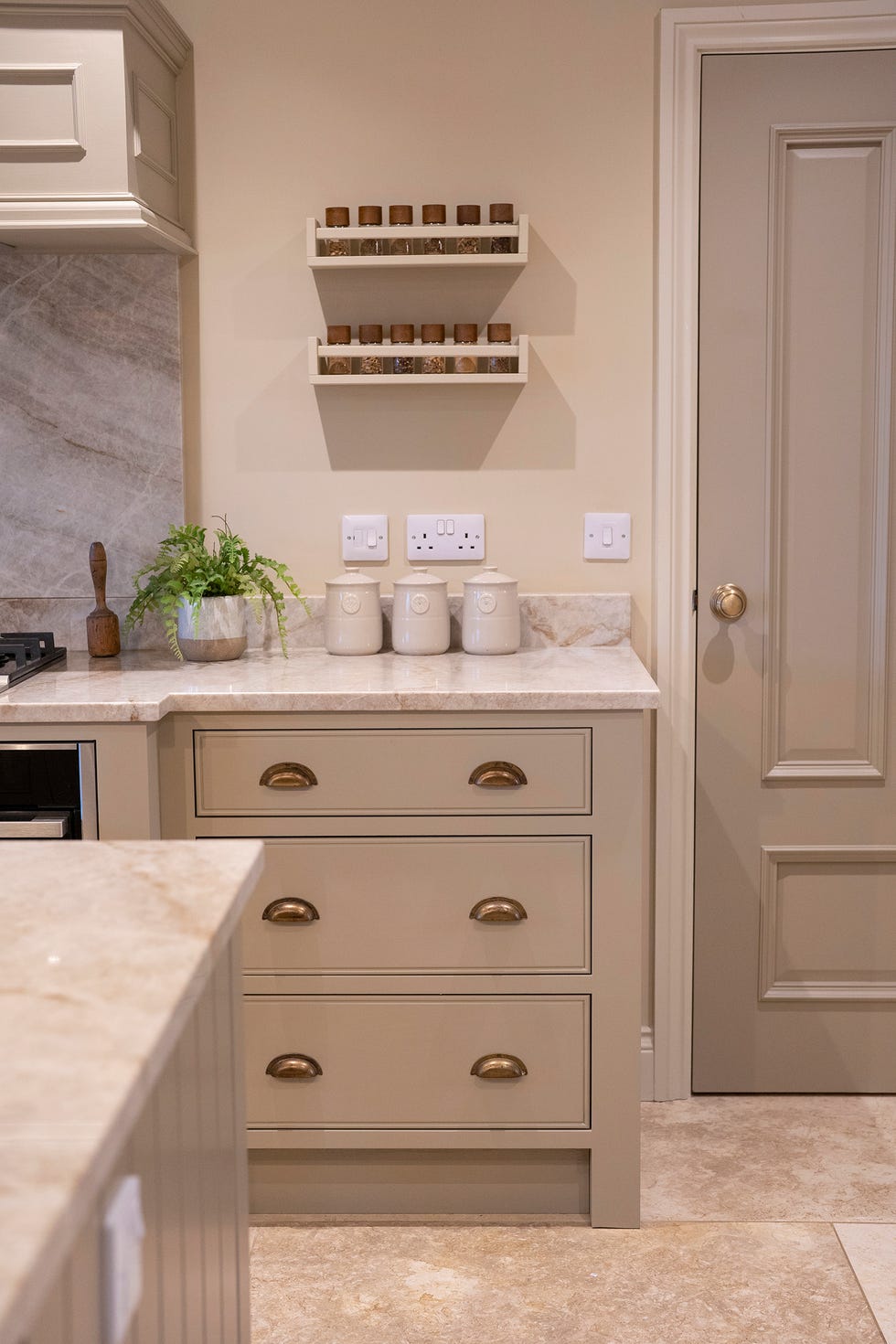 kitchen with beige cabinets