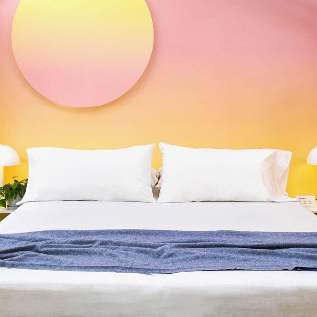 casper mattress bedding in pink and yellow room