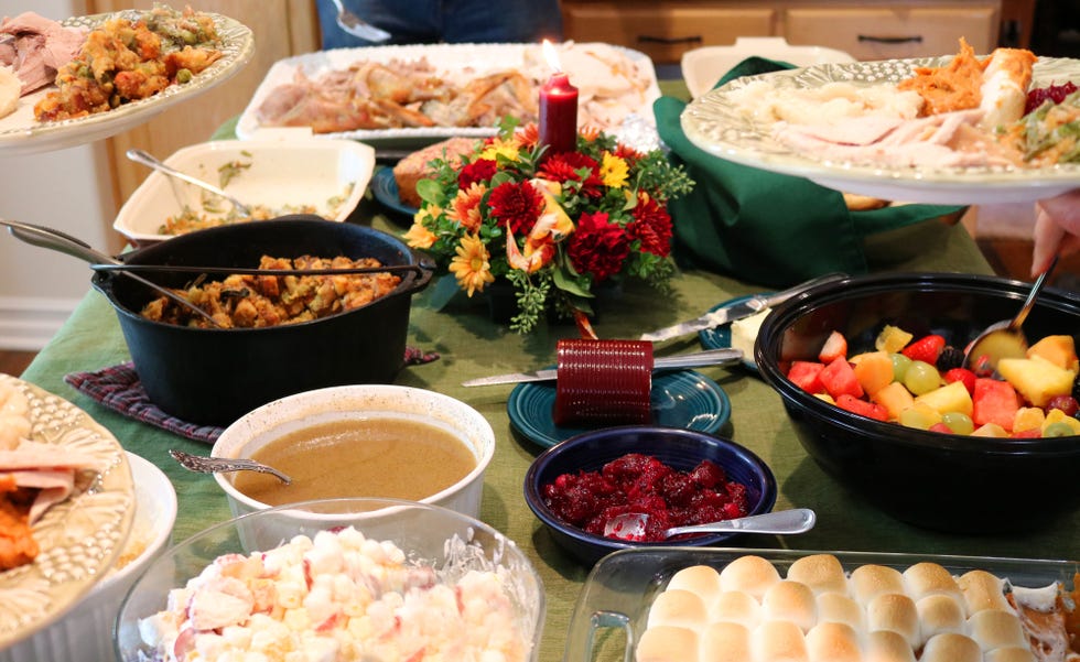 casual thanksgiving dinner with multiple plates