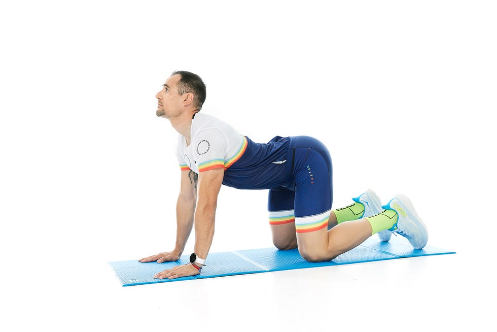 a man doing a plank on a mat