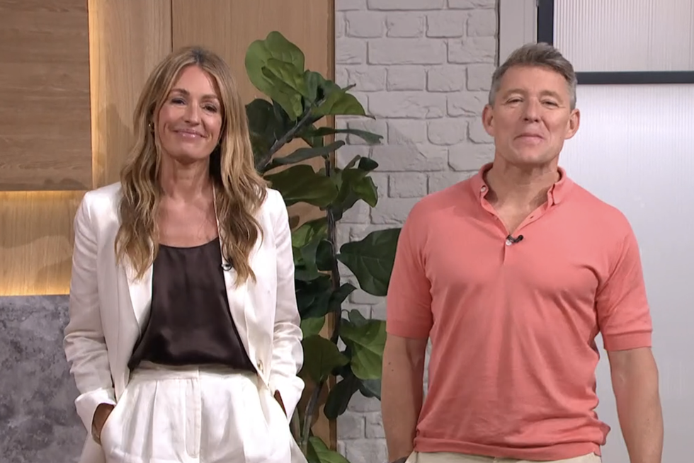cat deeley presenting this morning in a white suit with shorts